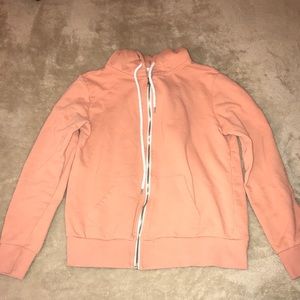 orange zip up